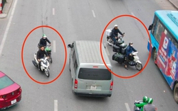 Xe máy nối đuôi nhau đi ngược chiều, cắt mặt ô tô trên đường Giải Phóng, Hà Nội