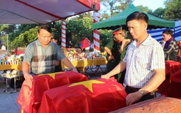 An táng 96 hài cốt liệt sĩ quân tình nguyện và chuyên gia Việt Nam hy sinh tại Lào