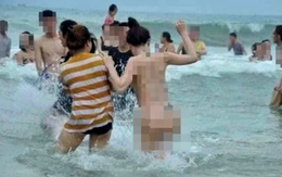 Thông tin mới liên quan tới bức ảnh chụp cô gái khỏa thân ở biển Sầm Sơn