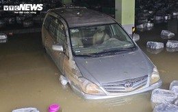 Hàng nghìn ô tô, xe máy ở Huế bị nhấn chìm trong bùn đất