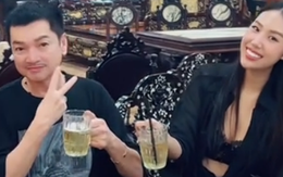 Vợ kém 37 tuổi của Quang Minh gây tranh cãi khi kéo áo để lộ rõ bra trước ống kính