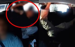 Mưa lớn khiến giao thông tê liệt, du khách la hét, ném điện thoại rồi có hành động phản cảm trên taxi