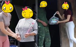 Hình ảnh cô gái mặc quần tập gym bó sát đi từ thiện gây tranh cãi