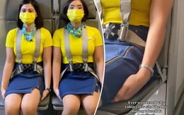 Vì sao các tiếp viên hàng không có tư thế “kỳ quặc” ngồi lên tay mình khi cất cánh và hạ cánh?