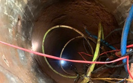 Người cha lao xuống giếng sâu 35 mét cứu con gái