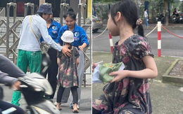 Em gái lớp 2 ngồi cổng trường thi đợi anh trai gây sốt mạng