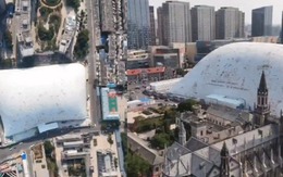 Độc đáo Trung Quốc: "Bong bóng" khổng lồ cao 50m bao trùm công trường, chặn sạch bụi và tiếng ồn!