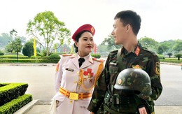 Vợ chồng trẻ trong đội hình A80: Người vác kèn 19kg, người giữ bình yên pháo trận