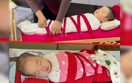 Kiểu nuôi con gây sốc: Trẻ sơ sinh bị buộc chặt trong nôi chứa cát để mô phỏng vòng tay mẹ
