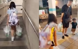 Bé gái 11 tuổi chật vật xách 24 lon bia, bố mẹ bị cảnh sát bắt giữ