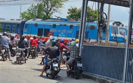 Cục CSGT lên tiếng về clip "ma che mắt" loạt tài xế vượt đường ray tàu hỏa khi chuông báo
