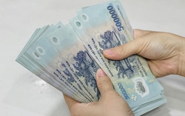 Phát hiện hàng trăm tờ tiền 500 nghìn đồng bỏ quên trong cây ATM