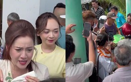 Nam NSƯT cùng con gái Vũ Linh phát gạo, người dân đứng chật ních