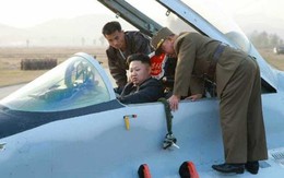 24h qua ảnh: Kim Jong-un lên chiến đấu cơ huấn luyện bay