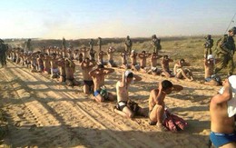 24h qua ảnh: Lính Israel canh giữ hàng dài tù binh Palestine