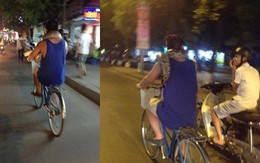 Kỳ lạ người đàn ông quấn trăn quanh cổ dạo phố Hà Nội