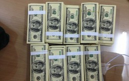 Nhờ người hộ tống mang cục tiền âm phủ từ ngân hàng về