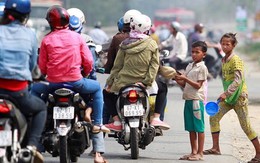 Trẻ không biết tiếng Việt bị chăn dắt trên quốc lộ 1