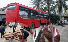 Chiêu ngụy trang nửa tấn gỗ trắc quý trên chiếc xe khách biển Lào