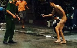 Hà Nội: Nam thanh niên khỏa thân cầm kéo đâm người điên loạn giữa phố