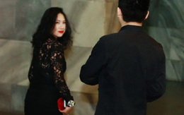 Vợ Tùng Dương né ống kính khi tới cổ vũ chồng trong đêm nhạc ngày Valentine
