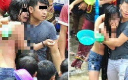 Phẫn nộ cô gái bật khóc vì bị lột tung áo trong lễ hội té nước