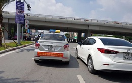 Cuộc chiến taxi: Có thể tịch thu những xe đã dán biểu ngữ?