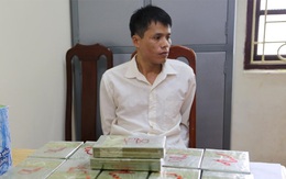 “Cửu vạn” vận chuyển 52 bánh heroin giá 100 triệu đồng