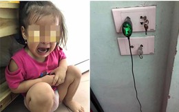 Bố mẹ nghe tiếng con gái khóc ré, chạy ra thì thấy điều khủng khiếp trong ổ điện