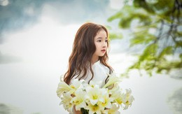 Vẻ đẹp mong manh của cô bé Hà Nội bên hoa loa kèn khiến cư dân mạng thổn thức