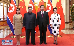 Chùm ảnh đầu tiên về chuyến thăm Trung Quốc của ông Kim Jong-un và phu nhân