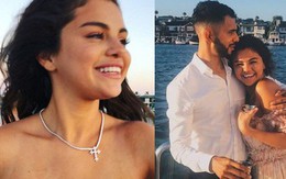 Selena Gomez diện váy trễ nải vòng 1, ôm trai lạ thân thiết trong tiệc sinh nhật tuổi 26