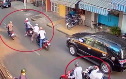 Người đàn ông đang đi xe máy bị 2 tên cướp kẹp cổ, quật ngã lấy xe giữa ban ngày