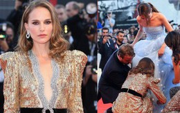 Trong khi nhiều sao nữ tị nạnh nhau, riêng Natalie Portman lại cúi mình chỉnh váy cho đàn em tại LHP Venice