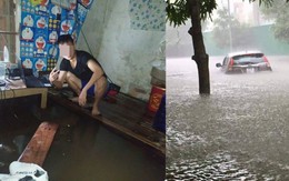 Mưa nhiều ngày ở Nghệ An, nước ngập đến tận giường, đi thuyền trong phố