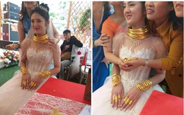 Danh tính cô dâu Cao Bằng đeo vàng "nặng trĩu cổ" khiến dân mạng xôn xao