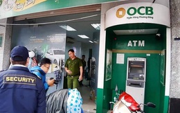 Bịt mặt, che camera trụ ATM ngân hàng Phương Đông để trộm tiền