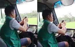 Tài xế xe buýt vừa dùng khuỷu tay lái xe vừa lướt điện thoại bị đình chỉ