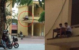 Quá nóng, 2 nam sinh mang bàn ghế ra ngoài lan can để hóng gió học bài