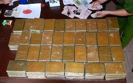 Người đàn bà tàng trữ trong nhà 160 bánh heroin