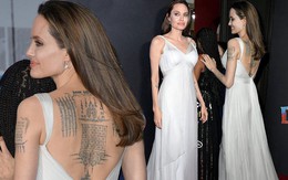 Angelina Jolie diện đầm gợi cảm, lộ hình xăm kín lưng cùng các con đi sự kiện