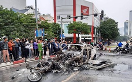 Tìm người nhà nạn nhân trong vụ xe Mercedes gây tai nạn rồi bốc cháy