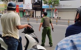Công an bao vây đối tượng nghi mang lựu đạn vào ngân hàng ở Sài Gòn