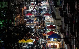 24h qua ảnh: Mọi người đi chợ đêm ở thành phố Vũ Hán
