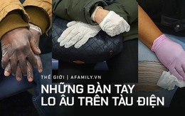 Bộ ảnh "Những bàn tay lo âu trên tàu điện" được chụp bằng điện thoại chứa đầy sự cô độc, lạ lẫm đến ám ảnh giữa mùa Covid-19