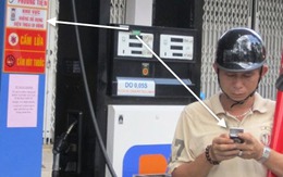 Vô tư nghe điện thoại trong cây xăng sau quy định cấm