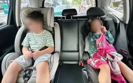 Người lớn ngồi ghế phụ ô tô có được ôm trẻ em ngồi cùng không? Cục CSGT giải đáp