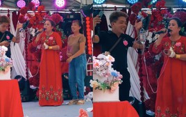 Clip dì cô dâu mang bình truyền nước lên hát đám cưới gây sốt mạng