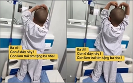 Nhói lòng với clip chiến binh ung thư nhí kiễng chân nhún nhảy gửi trái tim qua ô cửa kính như động viên bố: Ba ơi, đừng sợ!