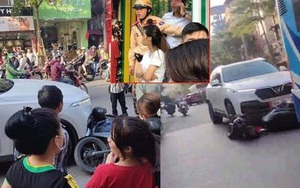 Ô tô SUV kéo lê xe máy SH trên phố Khâm Thiên